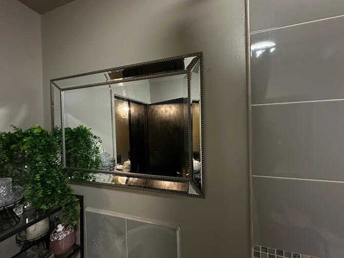 Mirror Installation - the bathroom mirror.